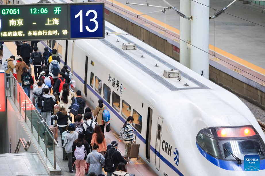 Đường sắt Trung Quốc tất bật xử lý 144 triệu lượt khách dịp nghỉ lễ 1/5 - Ảnh 4.