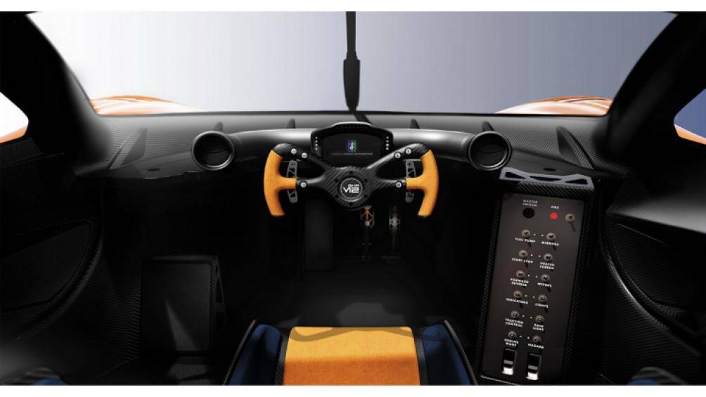 Vô lăng hình chữ nhật được làm bằng vật liệu sợi carbon với một số nút điều khiển cần thiết cho người cầm lái