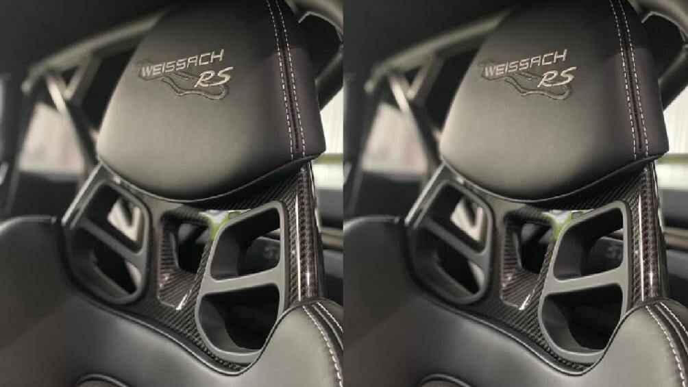 Bên trong khoang lái của xe có sự xuất hiện của ghế thể thao phong cách xe đua với khung ghế là sợi carbon, trên tựa đầu thêu dòng chữ Weisach Package