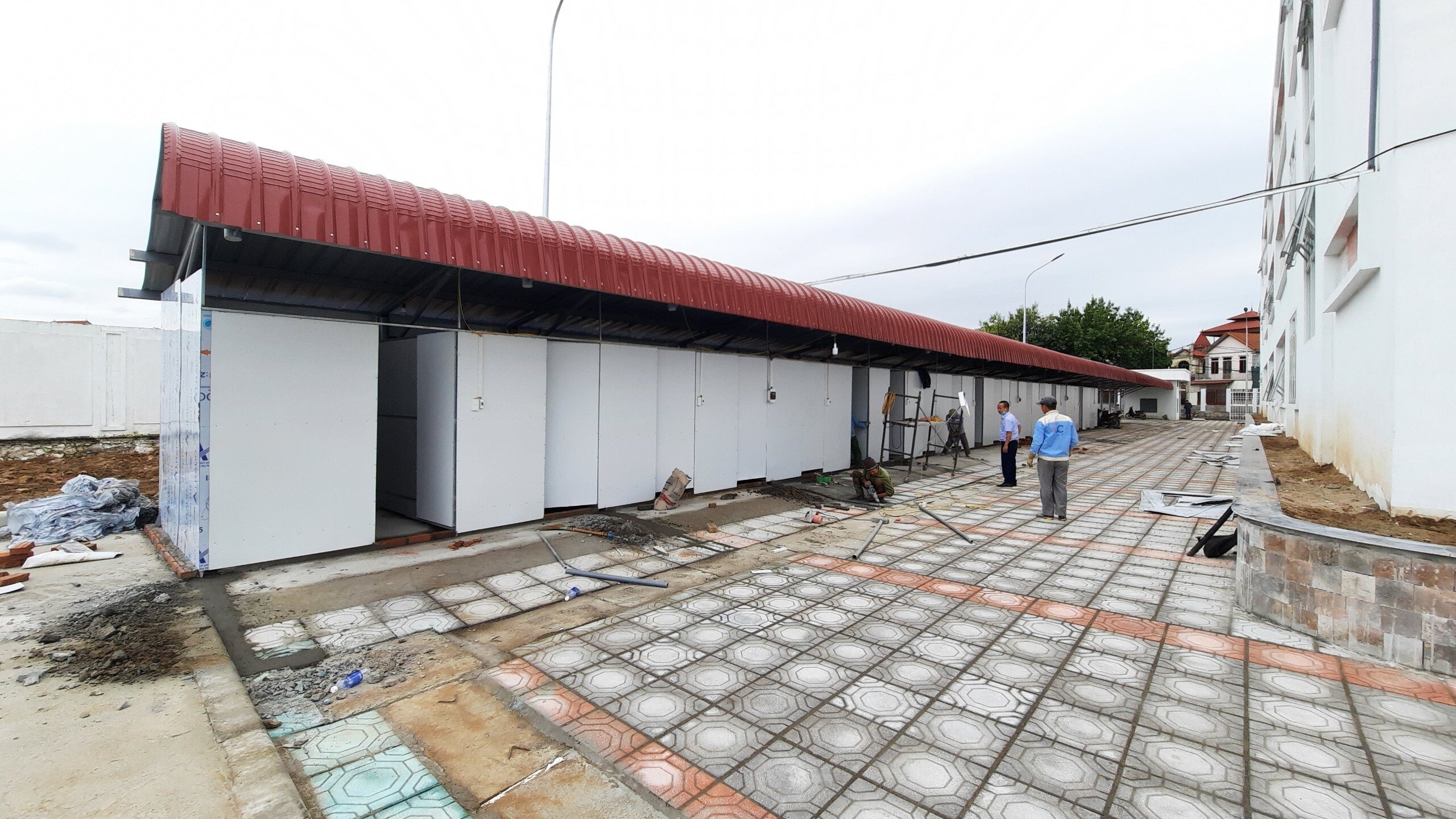 Theo dự kiến, Trạm y tế lưu động số 1 điều trị F0 của huyện Hoài Đức sẽ được vận hành chính thức vào ngày mai (23/11).