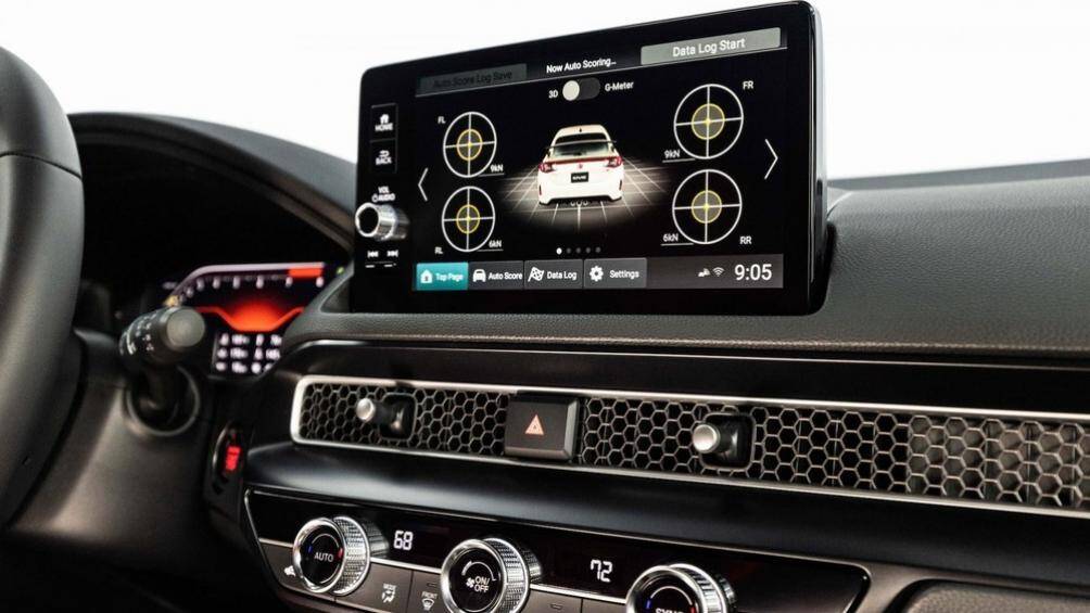 Bảng đồng hồ kỹ thuật số 10,2 inch và màn hình thông tin giải trí 9 inch và cửa gió điều hòa đi kèm tấm lưới kéo dài trên mặt táp-lô