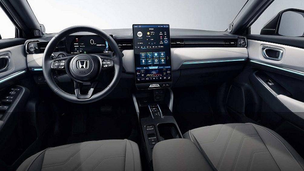 Bên trong Honda SUV e:prototype sở hữu màn hình cảm ứng lớn, có định dạng dọc, hệ thống điều khiển HVAC được tích hợp với màn hình giải trí