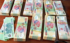 Bắt quả tang 2 mẹ con tàng trữ 60 triệu đồng tiền giả