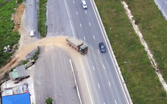 Nhiều xe chở đất phá hàng rào để vào cao tốc Mai Sơn - Quốc lộ 45