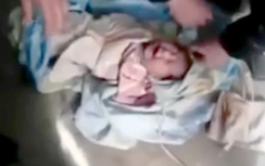 Bé sơ sinh bị mẹ vứt bỏ dưới hầm chứa phân bón tại Tajikistan