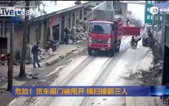 Xe tải bật nắp đập thẳng vào mặt người đi xe máy