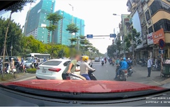 Sự thật video "ông Tây" bê nữ "ninja" và xe gọn vào lề đường