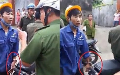 Sự thật video CA xã còng tay người đàn ông vào xe máy