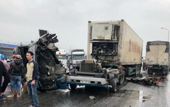 Xe container "rơi đầu" sau cú đâm xe tải, 3 người bị thương