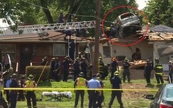 Chiếc SUV nằm gọn trên nóc nhà sau va chạm