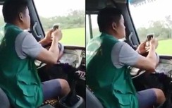 Tài xế xe buýt dùng khuỷu tay lái xe vừa lướt điện thoại bị đình chỉ