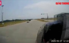 Video: Ô tô tải vượt đèn đỏ bị xe đầu kéo húc văng, lật ngửa giữa đường