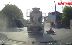 Video: Xe tải lấn làn vào cua, khiến 2 người đi xe máy suýt mất mạng