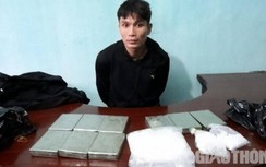 Giấu 9 bánh heroin trong xe máy hòng qua mặt cảnh sát