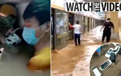 Mưa lụt lịch sử tại Trung Quốc gây vỡ đập, khách kẹt trong tàu điện ngầm