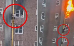 Thót tim cảnh 2 người trèo qua cửa sổ tầng 4 bị cháy, đu ống nước tụt xuống