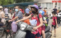 Có nên quy định đội mũ bảo hiểm cho trẻ dưới 6 tuổi tham gia giao thông?