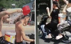 Xử phạt nhóm thanh niên vừa đi xe máy vừa tắm cho nhau ở Hoà Bình