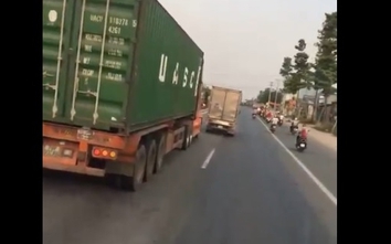 Video: Xe tải tạt đầu "trêu" container giữa phố Bình Dương