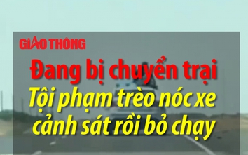 Đang bị chuyển trại, tội phạm trèo nóc ô tô uy hiếp cảnh sát