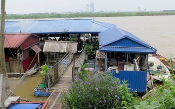 Né tránh trách nhiệm giải tỏa nhà hàng nổi trên sông Hồng