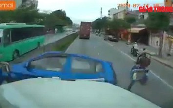 Video: Nữ tài xế liều lĩnh tạt đầu xe container bị tông văng trong tích tắc