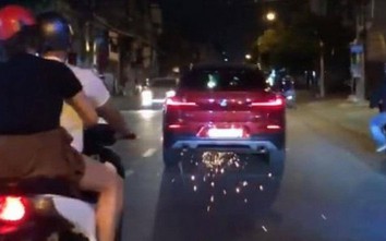 Nữ tài xế say xỉn lái BMW gây tai nạn rồi tháo chạy, cuốn xe máy vào gầm