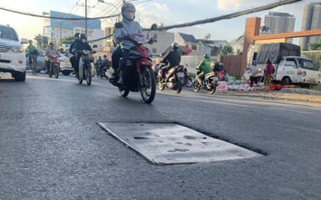 TP.HCM: Hố ga lồi lõm, nhếch nhác trên đường Nguyễn Hữu Cảnh vừa thông xe